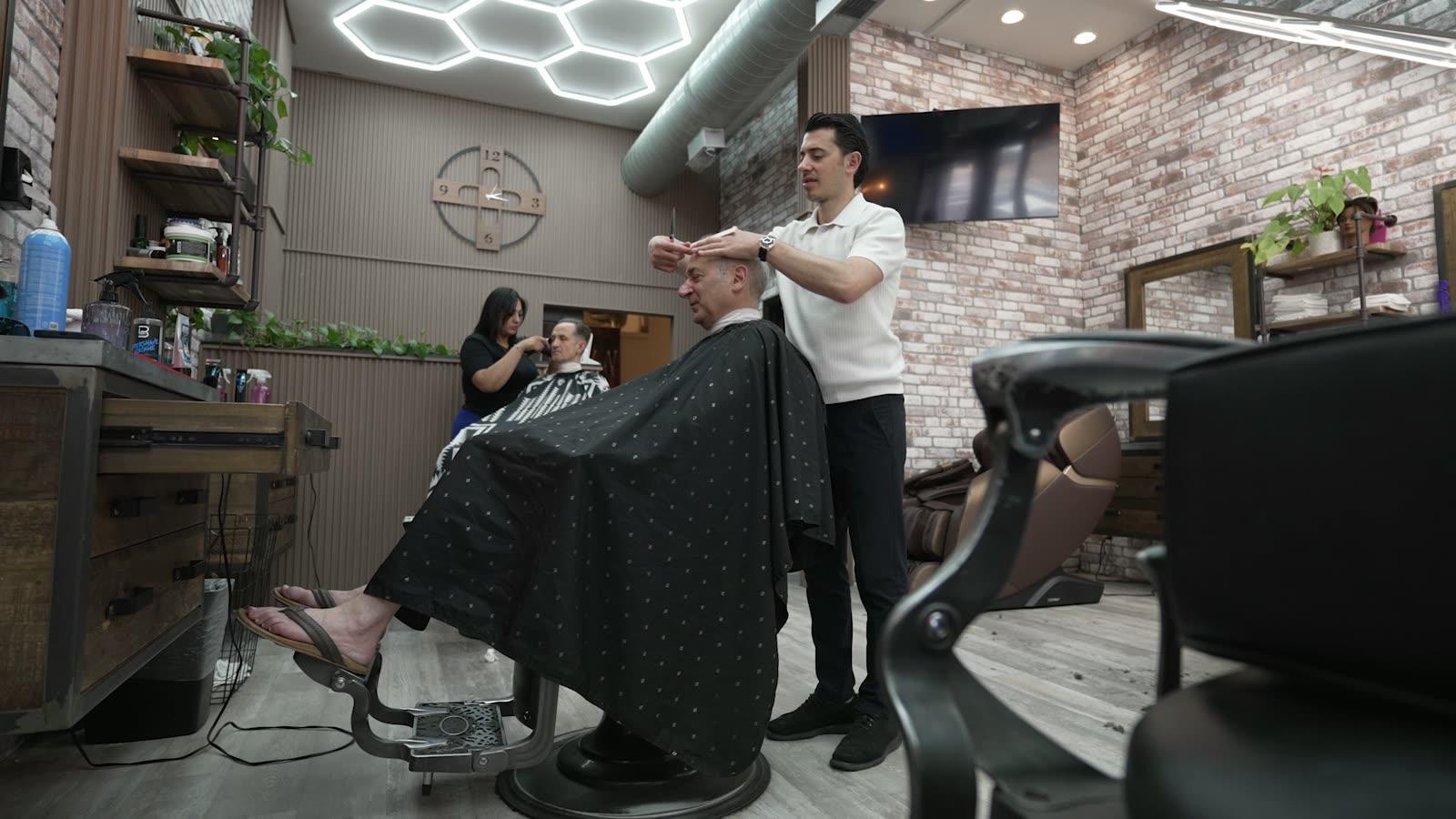 Alfani's Barbershop on E Colfax Ave in Denver - master barber delivering a precision fade