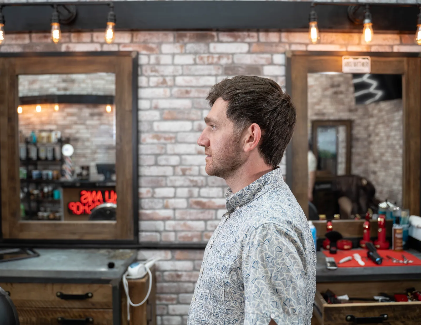 Finished men's textured haircut and beard trim result at Alfani's Barbershop Denver