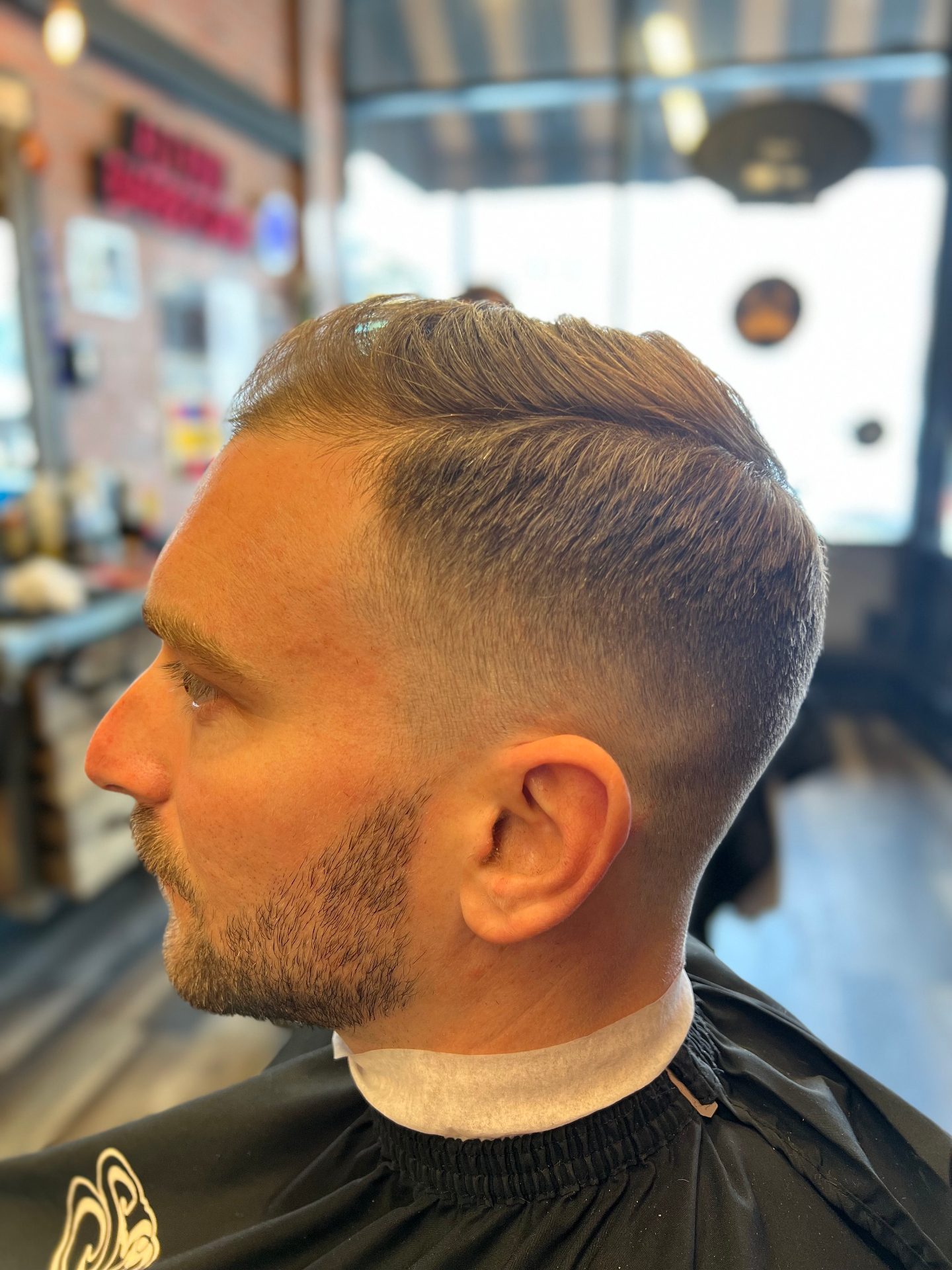 Precision beard trim at Alfani's Barbershop
