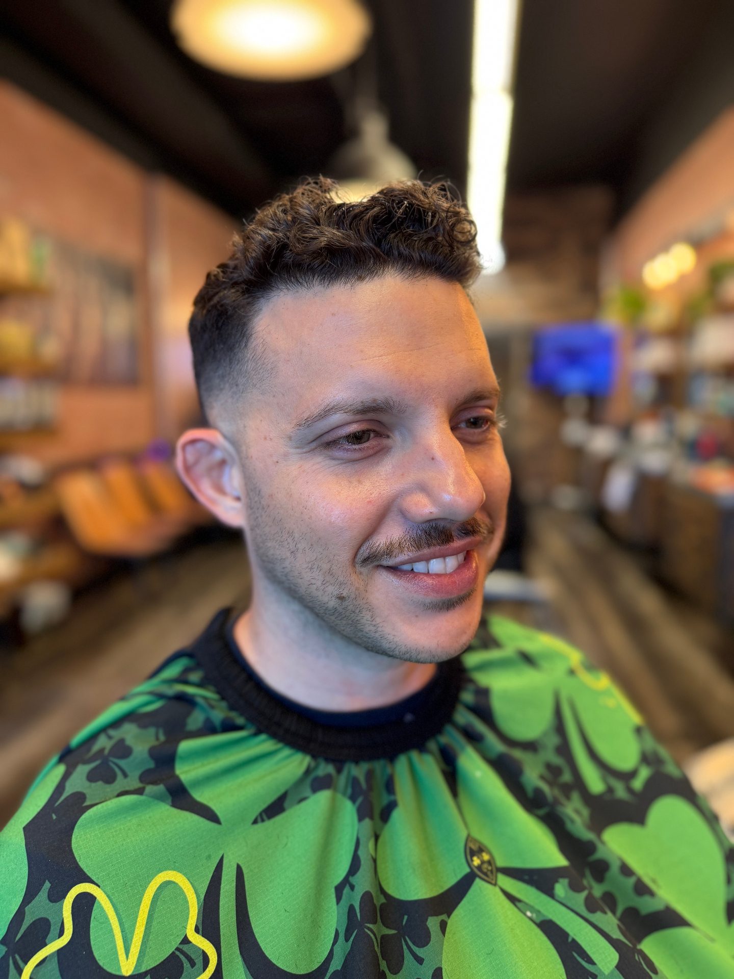Professional barber service at Alfani's Denver